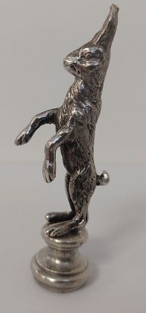 Solid silver seal representing a standing...