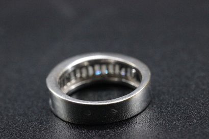 American wide-edged wedding band in 18k white...