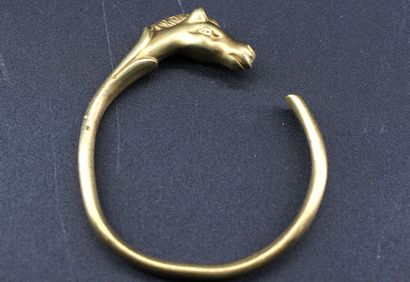 HERMES - Gilt metal bracelet with stylized...