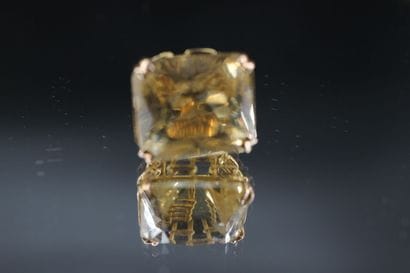 18k yellow gold ring set with a large rectangular...