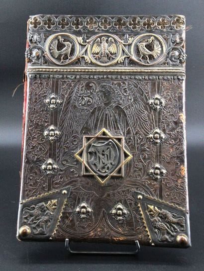 Leather document holder stylizing a cherub...