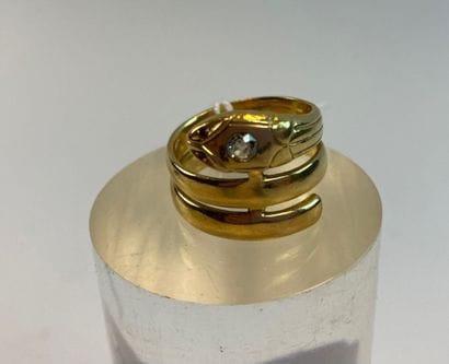 18k yellow gold snake ring set with an old-cut...