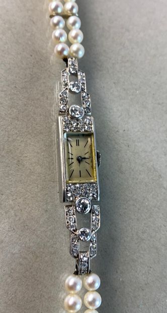 Ladies' watch in platinum adorned with diamonds,...
