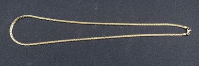 Collier en or jaune 18k à mailles tréssées....