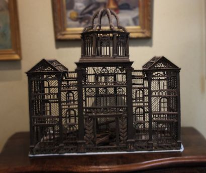 Wood and metal birdcage. Late 19th century....