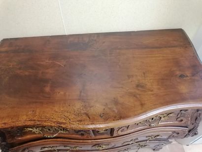 Chest of drawers in natural wood opening...