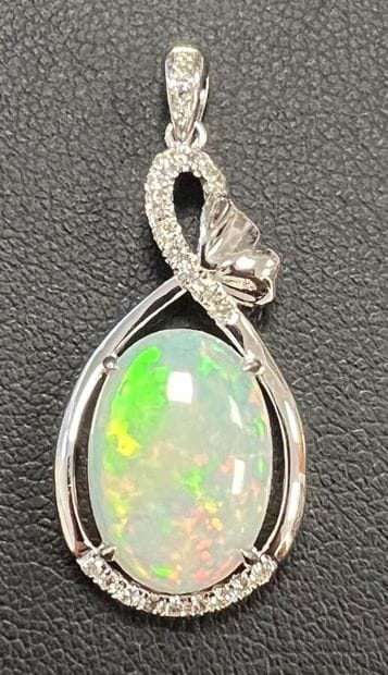 Pendant in 750°/.(18K) white gold adorned...