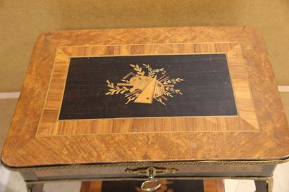Marquetry book table, top decorated with...
