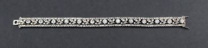 Articulated bracelet in 18k white gold adorned...