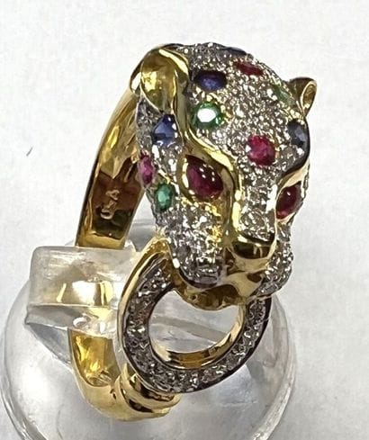 Panther ring in 750°/.(18K) yellow gold set...