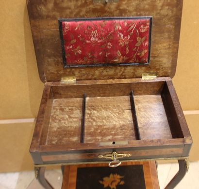 Marquetry book table, top decorated with...