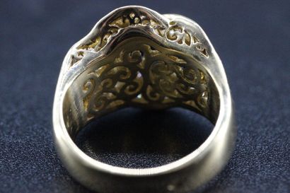 18k yellow gold ring set with a sapphire...