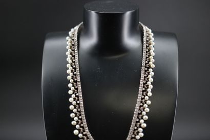 Necklace in 18k white gold adorned with small...