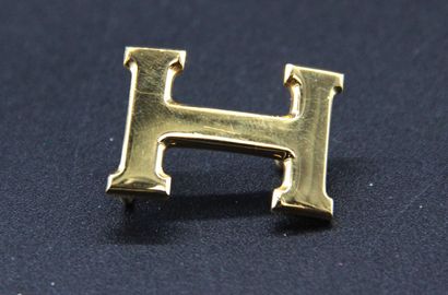 HERMES - Set of a gilt metal belt buckle....