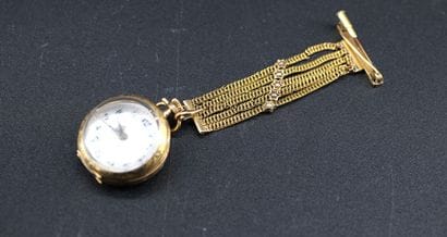 Montre de col et son attache en or jaune...