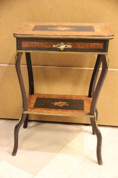 Marquetry book table, top decorated with...