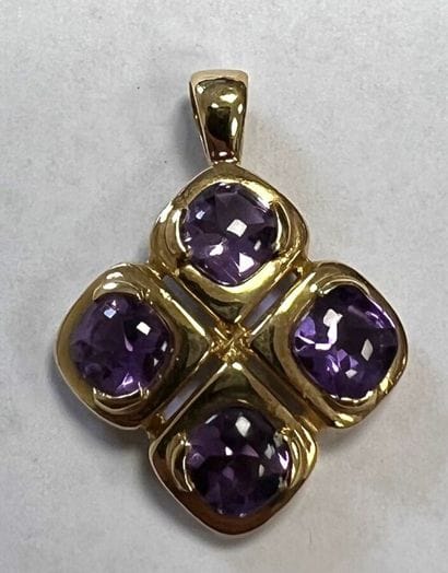 Very attractive four-lobed pendant in 750°/.(18K)...