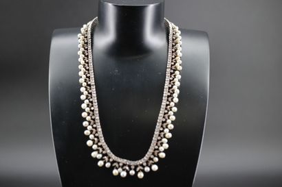 Necklace in 18k white gold adorned with small...