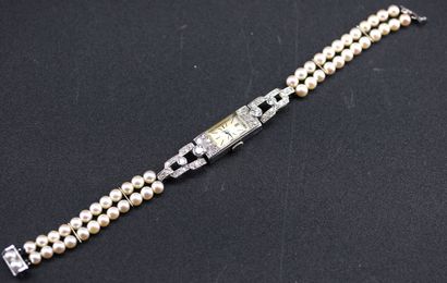 Ladies' watch in platinum adorned with diamonds,...