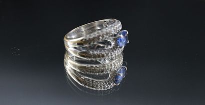 18k white gold ring set with a sapphire and...