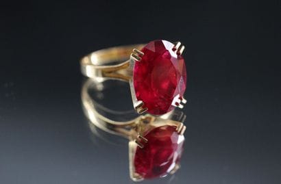 18k yellow gold ring set with a treated ruby....