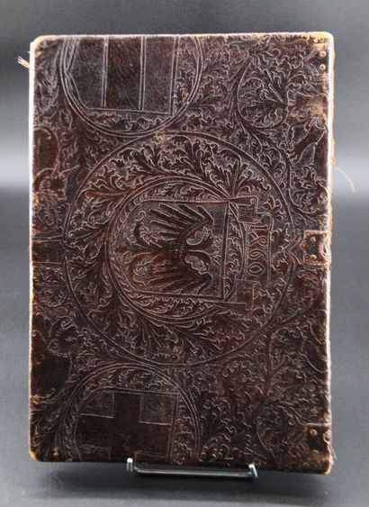 Leather document holder stylizing a cherub...