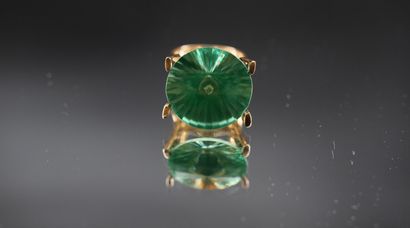 14K yellow gold ring set with a large stylized...
