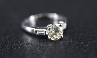 Solitaire in 18k white gold set with a modern-cut...