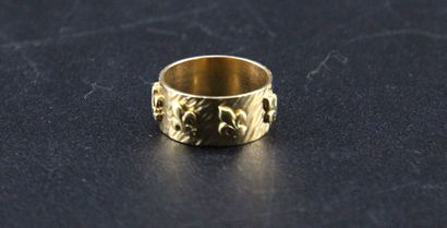 Bague bandeau en or jaune 18k à décor de...