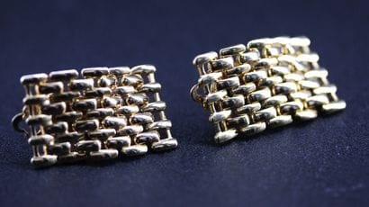 Pair of low-cut yellow gold earrings ???...