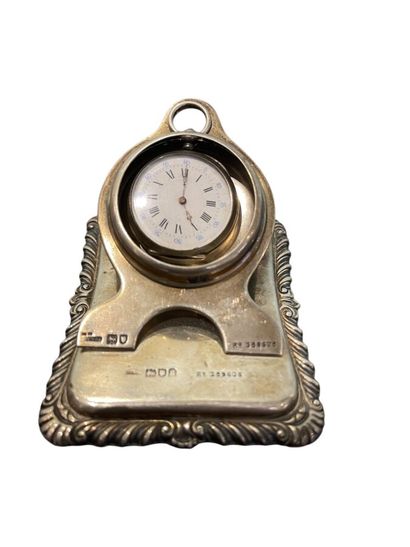 Set including a silver salt cellar with glass...