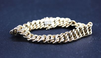 Bracelet en or 18 k 750 /° à mailles articulées....