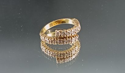 Bague type alliance en or jaune 18k 750/°...