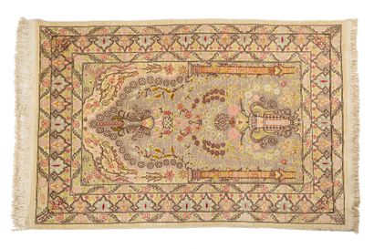 HÉRÉKÉ silk carpet, signed, embroidered with...