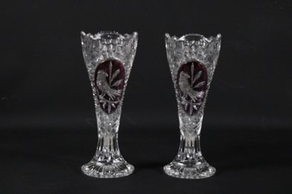A pair of large cut-crystal vases with poly-lobed...
