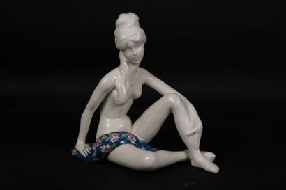 Louviere. Seated woman in cracked ceramic,...