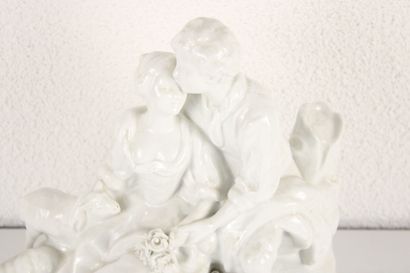 Large porcelain group featuring a pastoral...