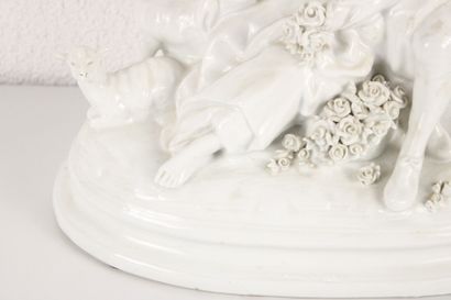 Large porcelain group featuring a pastoral...