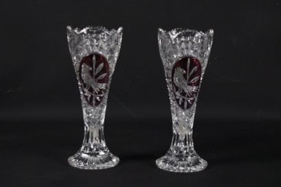 A pair of large cut-crystal vases with poly-lobed...
