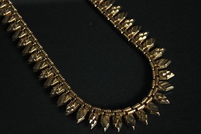 Collier ras de cou en or jaune 18K (750/1000)...