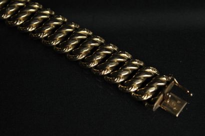 Bracelet en or jaune 18K (750/1000) à mailles...