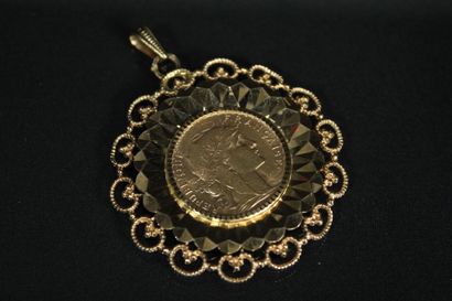 Pendentif en or jaune 18K (750/1000) orné...