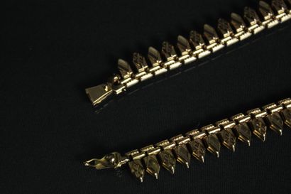 Collier ras de cou en or jaune 18K (750/1000)...