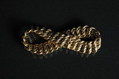 Bracelet en or jaune 18K (750/1000) à mailles...