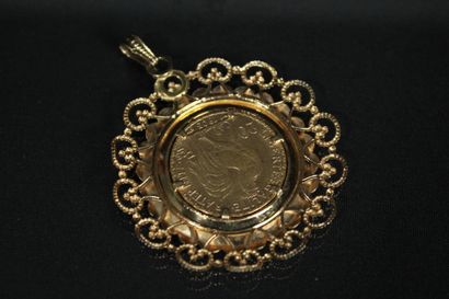 Pendentif en or jaune 18K (750/1000) orné...