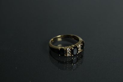Bague en or jaune 18K (750/1000) sertie de...