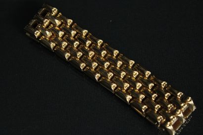 Bracelet en or jaune 18K (750/1000) à mailles...