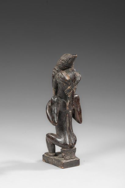 BAOULE - Seated ancestor with attributes...