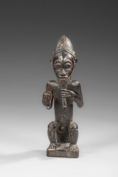BAOULE - Seated ancestor with attributes...