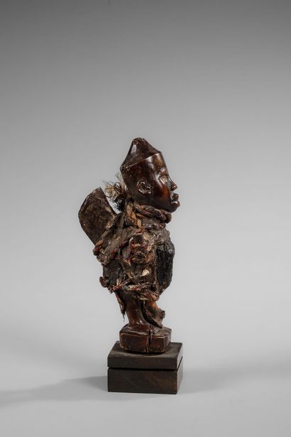Kongo Nkisi fetish - Nkonde with its attributes...